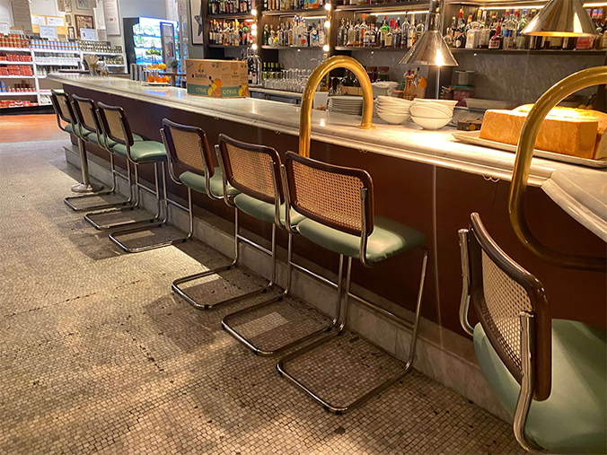Eataly New York interior seating area with modern chairs and tables